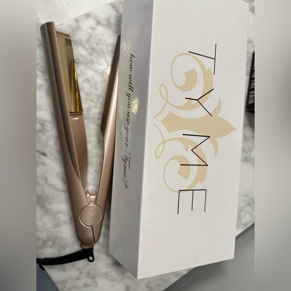 Tyme Curling Iron with box and storage sleeve